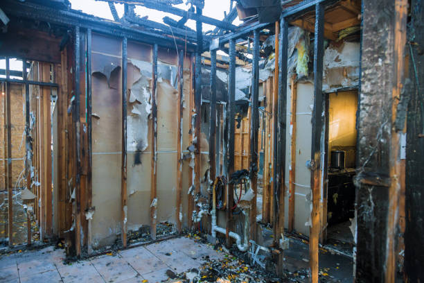 Professional Fire Damage Restoration technician working in Russiaville, IN